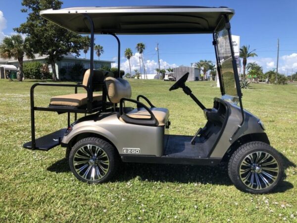 The E-Z-GO TXT golf car delivers a consistently smoother ride and improved energy efficiency by fusing industry-leading technology with tried-and-true dependability. With its 48-volt electric drivetrain and TruCourseTM Technology, it provides your course with the ideal mix of efficiency and performance.